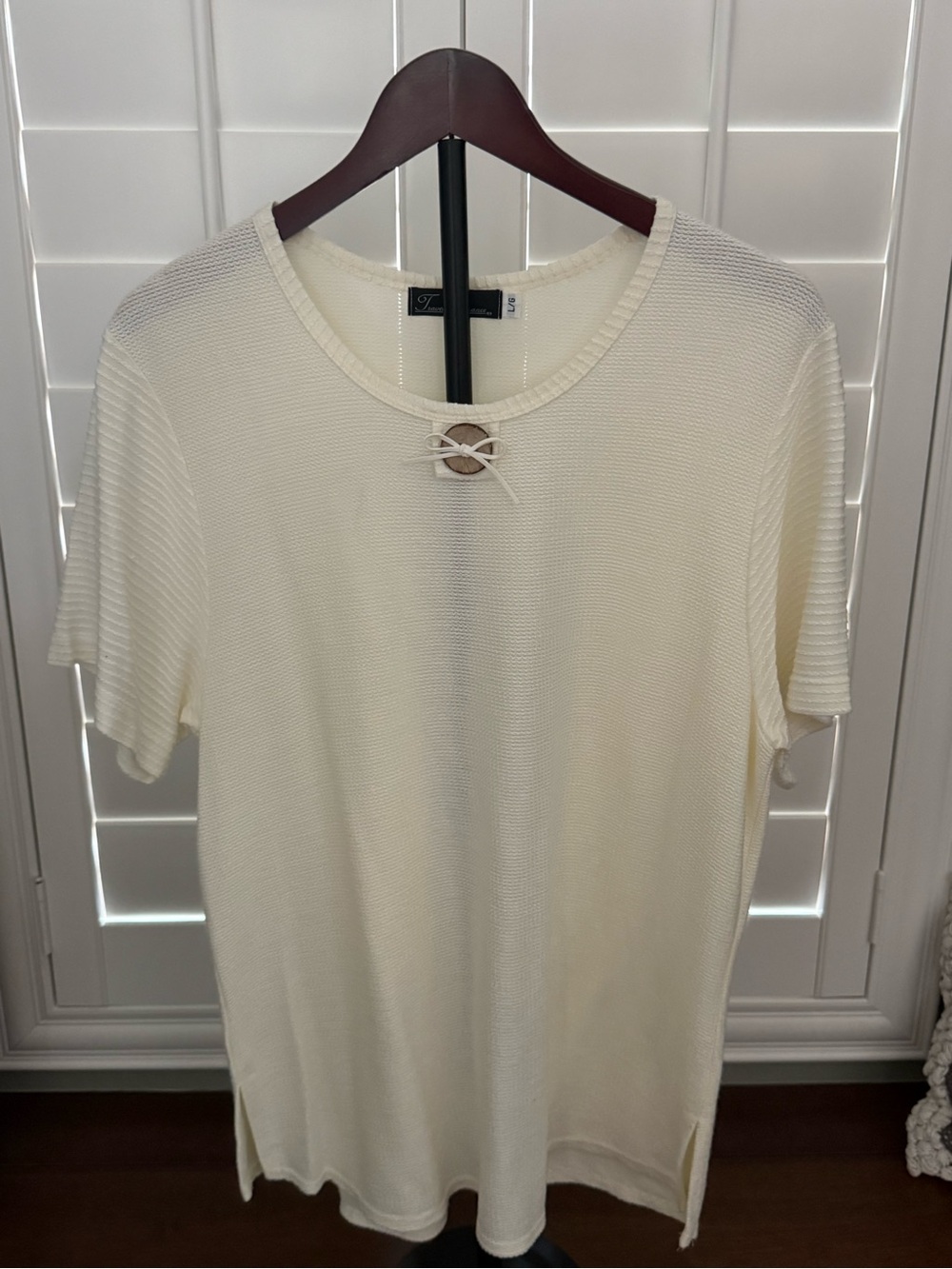 Travel Elegance Cream Short-Sleeve Knit Top with Ring Detail